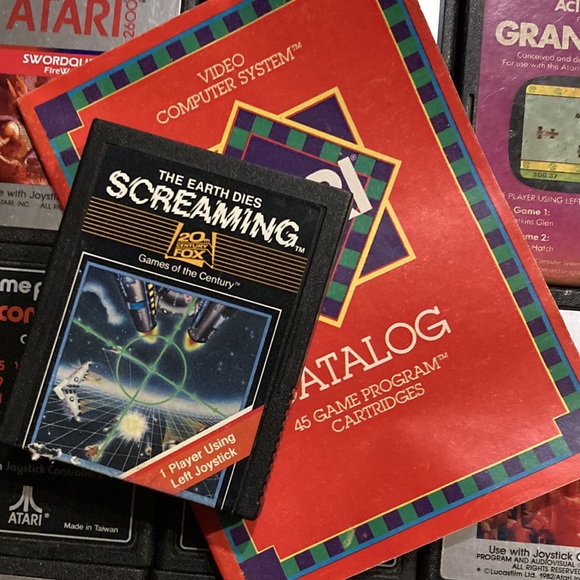 21 vintage Atari games, includes the earth dies Screaming 1983 - Picture 2 of 8